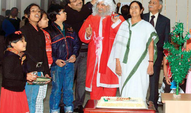Santa Claus comes to Writers`, CM greets all on X`Mas Day Santa Claus comes to Writers`, CM greets all on X`Mas Day