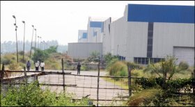 Tata Motors welcome to return to Singur, provided they return land to unwilling farmers: Partha Chatterjee