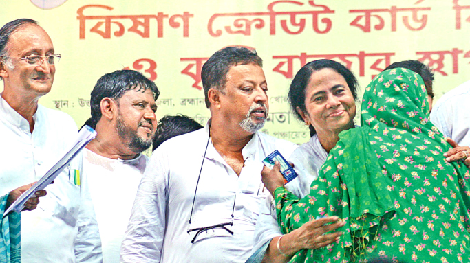 Chief Minister gives away Kisan Credit Card at Basirhat, also unveils railway projects Chief Minister gives away Kisan Credit Card at Basirhat, also unveils railway projects