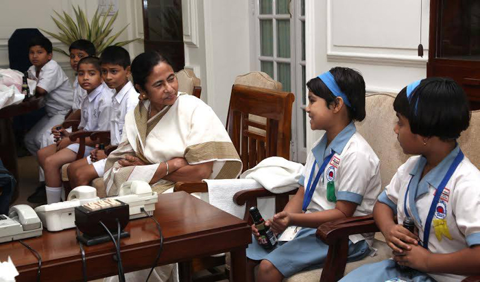 Mamata Banerjee with school kids