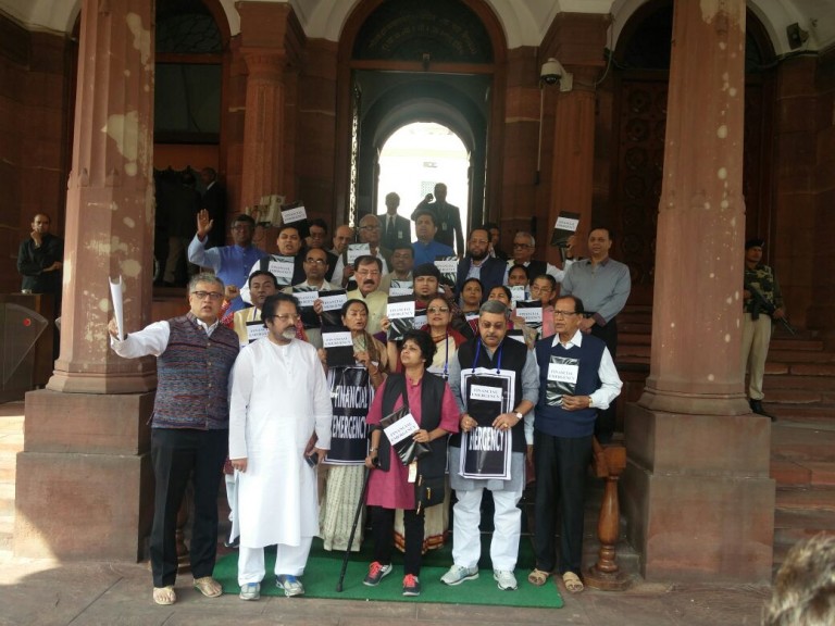 Trinamool MPs protest against ‘financial emergency’ in Parliament Trinamool MPs protest against ‘financial emergency’ in Parliament