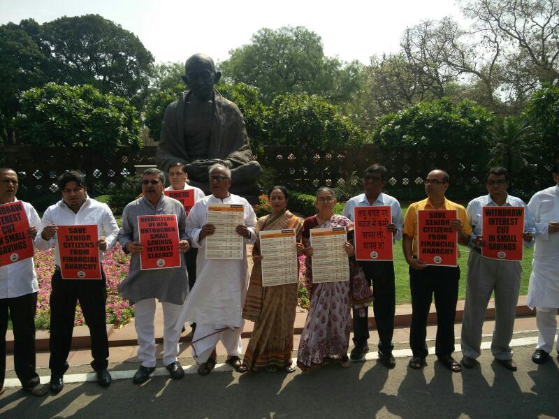 Trinamool MPs protest outside Parliament against interest cut in small savings schemes Trinamool MPs protest outside Parliament against interest cut in small savings schemes