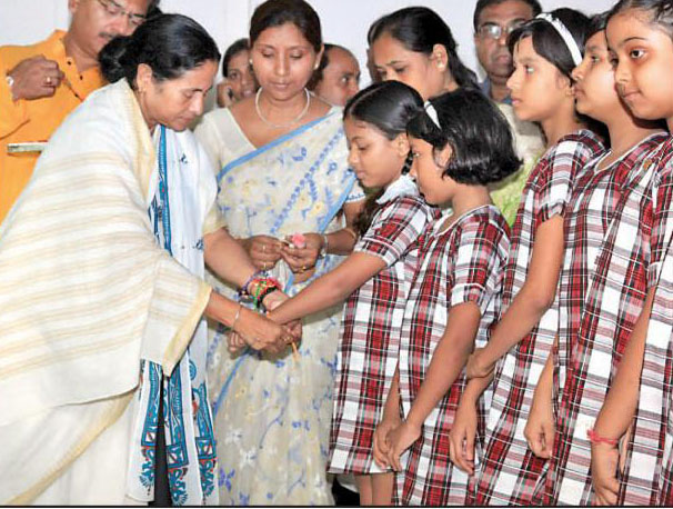 Didi celebrates Rakhi Bandhan, ties Rakhi at Writers` Didi celebrates Rakhi Bandhan, ties Rakhi at Writers`